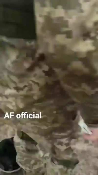 Ukrainian Soldiers enjoying a lunch break from all the fighting 