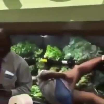 Female contaminates food in a grocery store