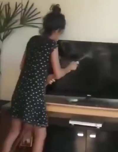 I'm just cleaning the tv like you asked me ma