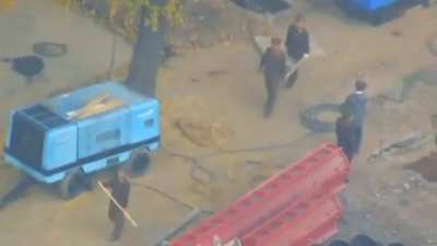 rare video smuggled from North Korea showing soldiers at work in a construction site 