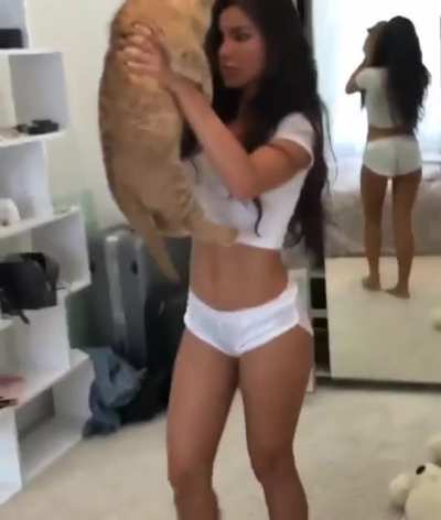 Baby lion cub meets model
