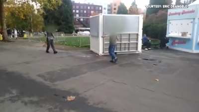 Guy holds a knifeman at gunpoint