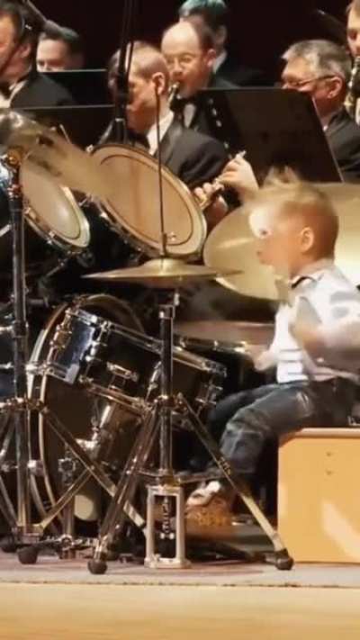 3-year-old playing the drums
