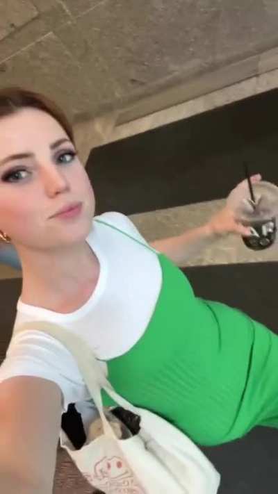 Prancing through New York in her green dress (June 2023)