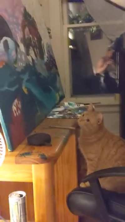 Little does he know his painting is covered in greebles. Silly hooman.