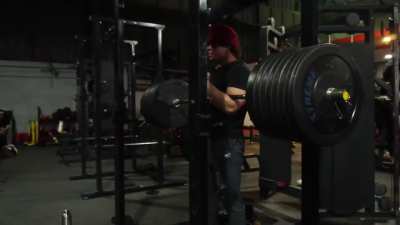 180 kg / 397 lbs. Nuzzled in the arms and squatted. Like an overweight baby. Or a torta.