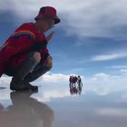 Giant man traps helpless tourists