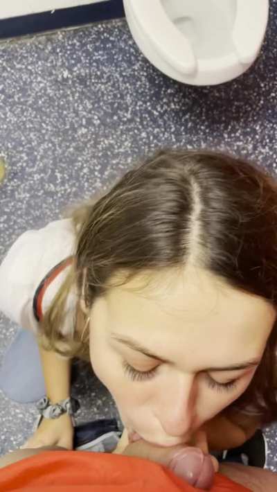 Giving a blowjob in the stall at the game