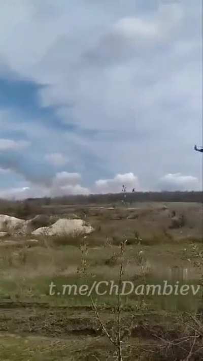 Mi-35M attack helicopter of the Russian Air Force's fires unguided missiles at the Ukrainian armed forces' positions in Donbass.