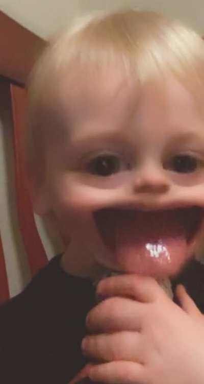 2yo enjoying Snapchat filters