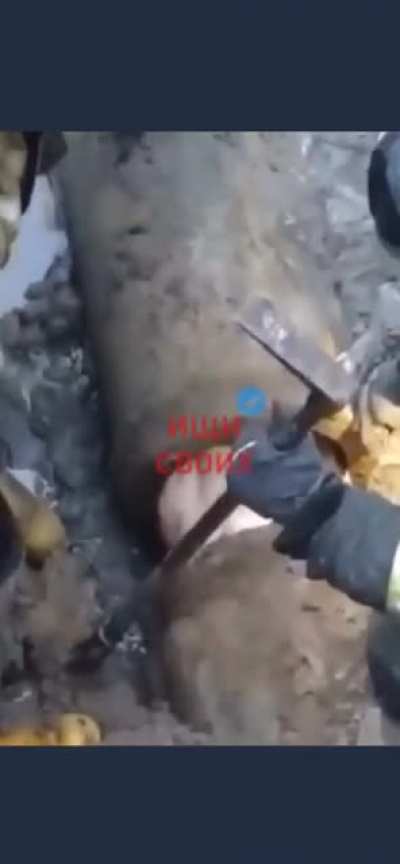 Russia - Man stuck in pipe
