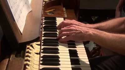Tubular Bells by Mike Oldfield played on a church organ. It's better known by its colloquial name 
