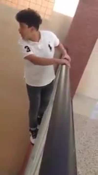 Kid jumps off stairs