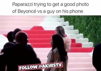 Paparazzi yelling at man blocking Beyoncé