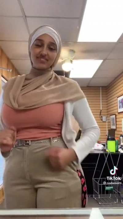 🧕🏽