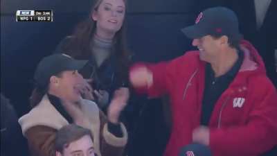 NHL rookie Trent Frederic delivers an epic beatdown on his debut game for the Boston Bruins. Crowd goes wild. His mom and dad, watching from the stands, fist pump and high five in an ecstasy of pride.