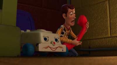 Woody Answers a Phone Call
