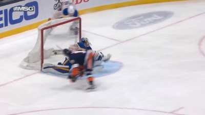 New York Islander Mat Barzal Scores a goal between his legs