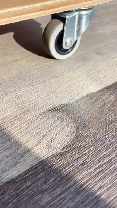 Grooved veneer top stain removing with laser