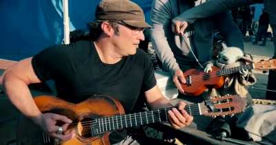 Sequel to Robert Rodriguez playing the guitar with Baby Yoda