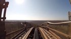 Michael Gira rides a rollercoaster