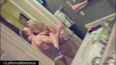 She takes it pinned against the door