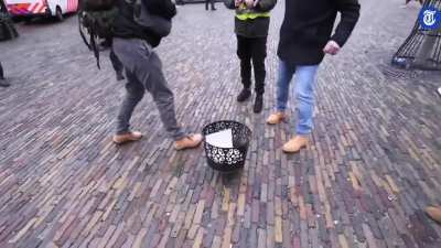 Tension between protesters, police, and participants at a Quran burning event in Netherlands