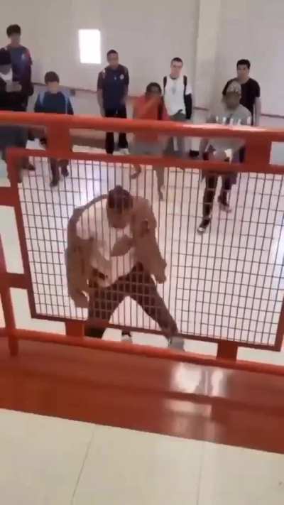 Teacher fights student for repeatedly calling him the 'n-word' in the school hallway