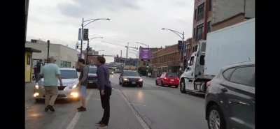“Professional Assassin” erupts after driver turns right on red into crosswalk in Chicago.