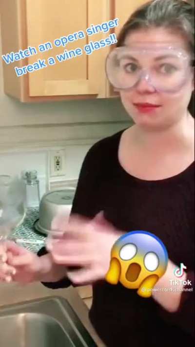 Opera singer break a wine glass