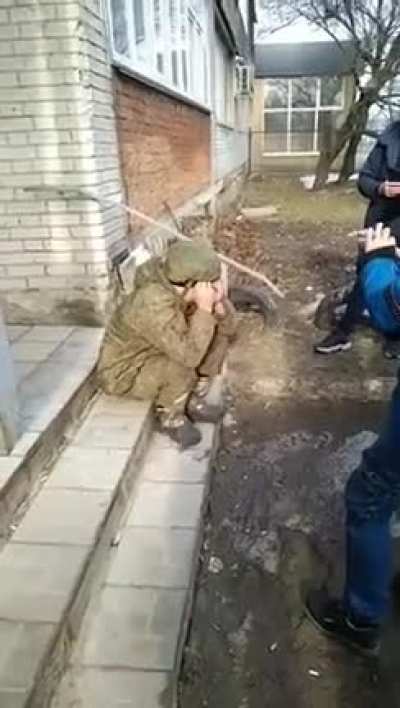 Young Russian soldier cries as the local residents of Sumy tell him that he is not welcome in their country