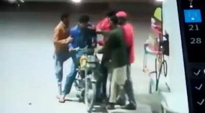 Lighting a cigarette at a Petrol Station