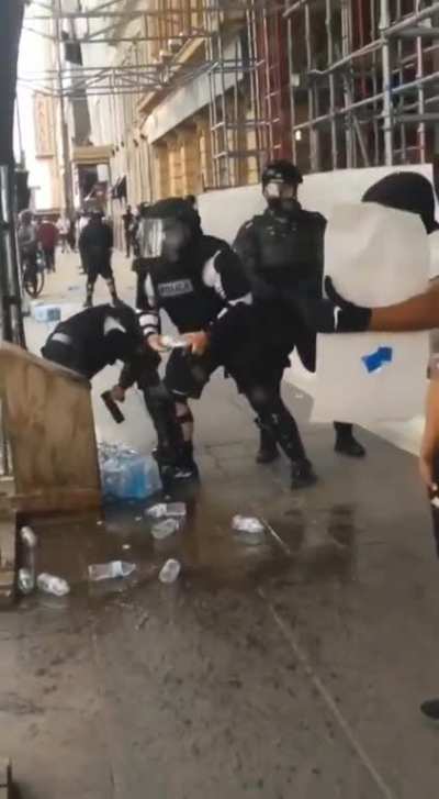 Police are taking peaceful protester's water to prevent them from being hydrated...?