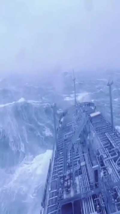 Cargoship battling the waves