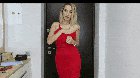 Taking off her red dress