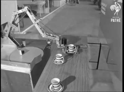 Table-clearing robot designed and built by the Engineering Department of Queen Mary College in 1969
