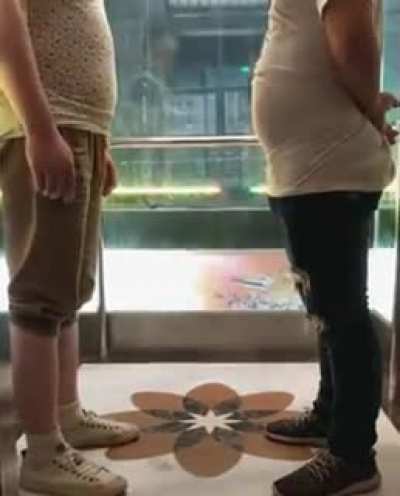Two gentlemen in the elevator