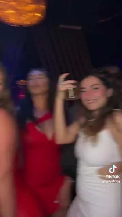 anyone knows the girl in red ??