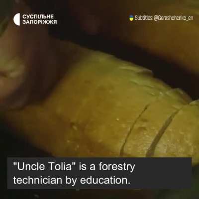 Uncle Tolia feeding the First Tank Artillery division. 