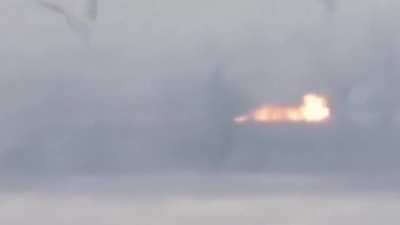 Drone footage of a Russian soldier on a motorcycle transporting flammable material getting hit by a Ukrainian FPV quad.