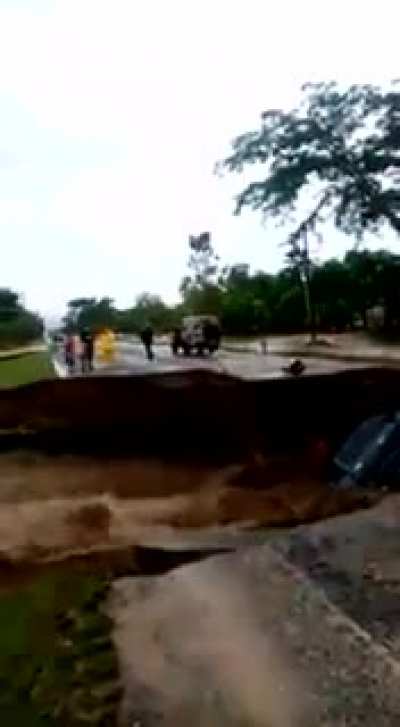 Car falls into sinkhole formed by nonstop rain from tropical storm Eta in Honduras