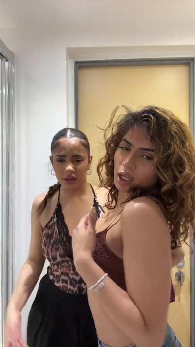 Massaging her tits