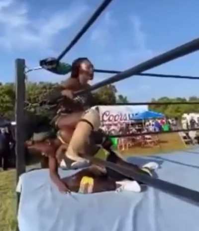 Queen Aminata uses her opponent’s face as a towel on a hot summer day.