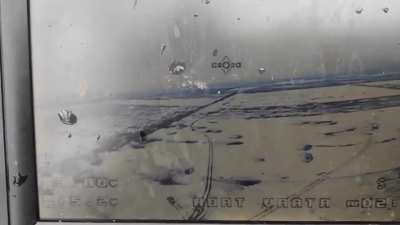 Ukrainian kamikaze drone attacking russian armor