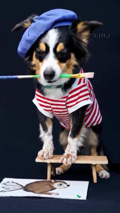 Prompt: A mini Aussie painting a picture of his favorite toy