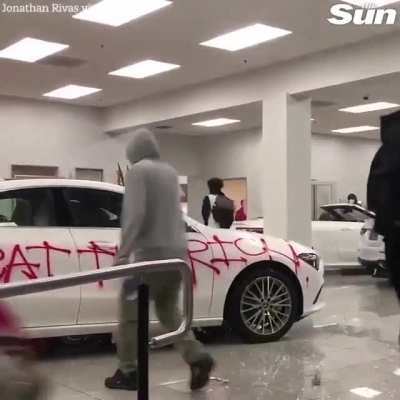 Protesters demolish and set fire in Mercedes Centre in Oakland