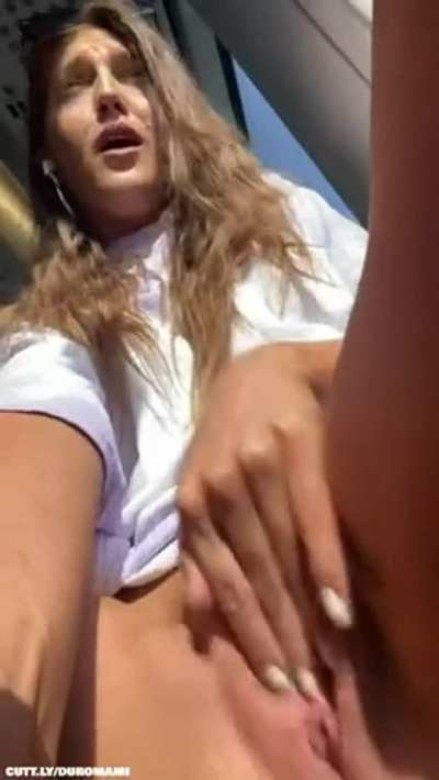 Cute girl masturbates in public
