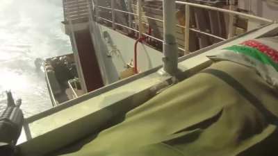 Somewhere off the coast of Somalia on the Indian Ocean, a Vessels private Security defends the vessel from an attempted boarding attack. (2012)