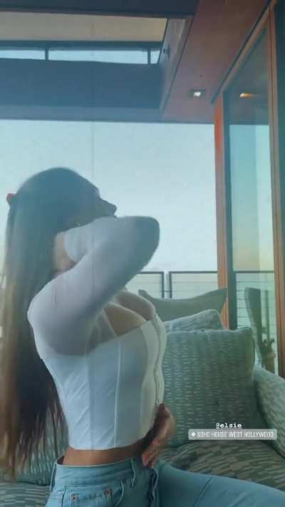 playing with her hair