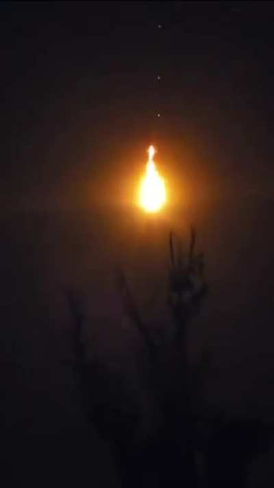 Mobile footage of an Iranian/Russian Shahed UAV getting hit by a Ukrainian interceptor drone during the night. 20/09/2025